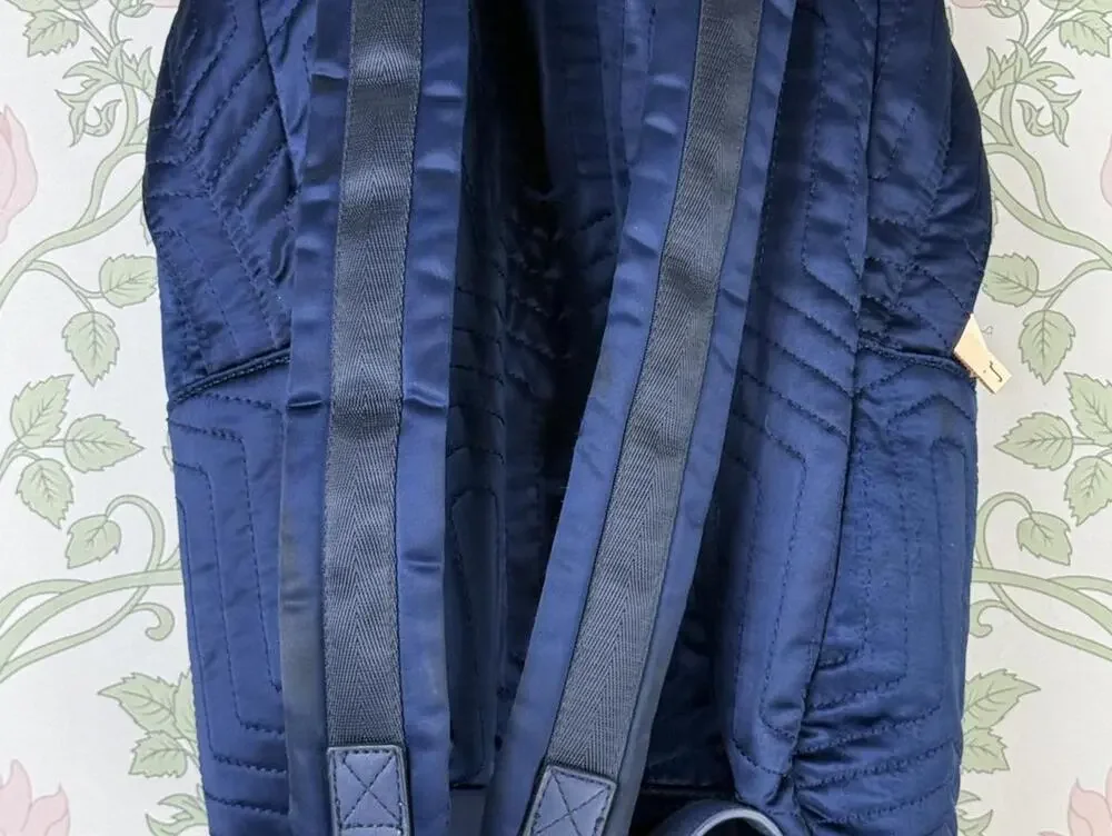 Ted Baker Akija Navy and Rose Gold Quilted Bow Backpack